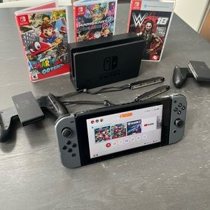 Nintendo Switch Gray Wi-Fi expandable storage all accessories plus 3 games.